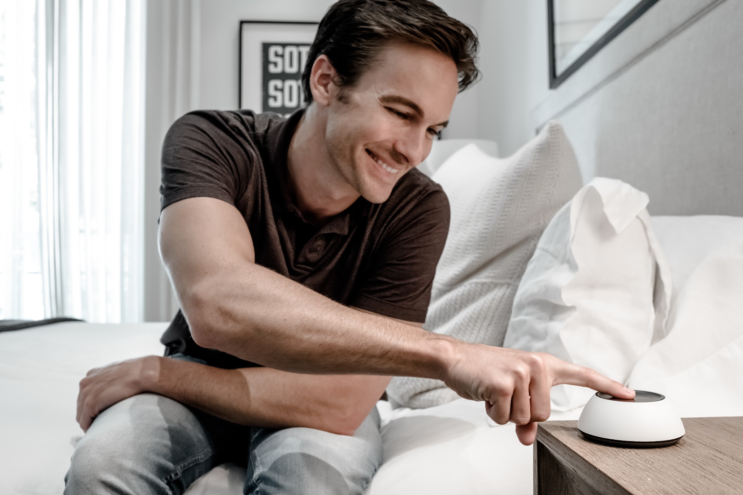 Josh.ai touchscreen keypad finish-matched into a luxury bedroom interior